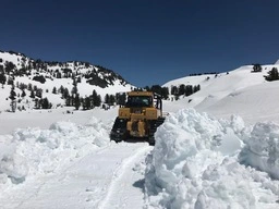 A bulldozer clears the way